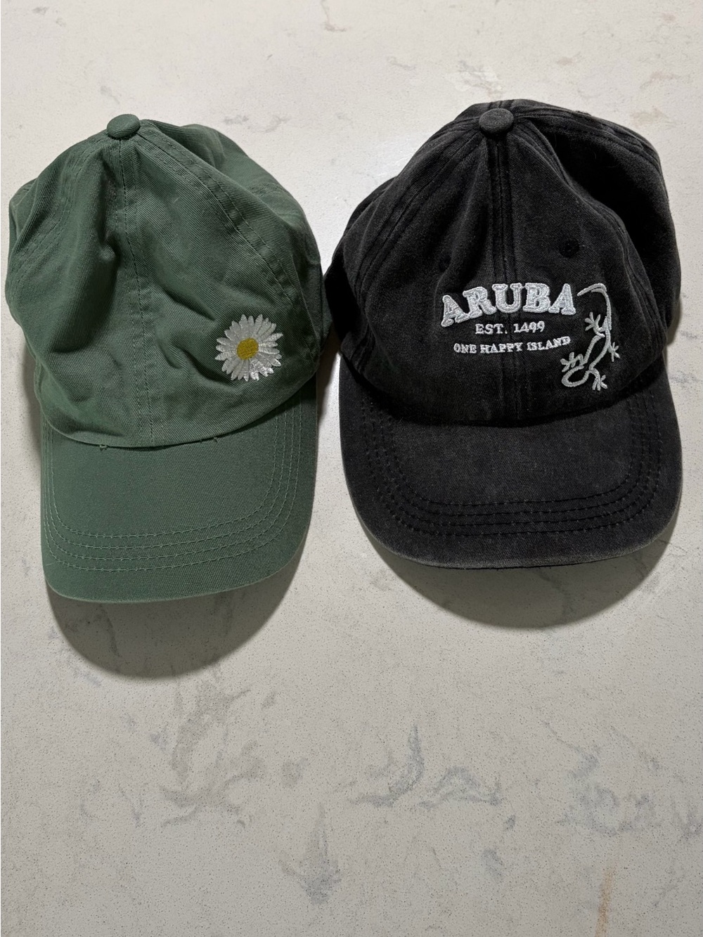 Green Daisy Embroidered Cap & Black Aruba Logo Hat